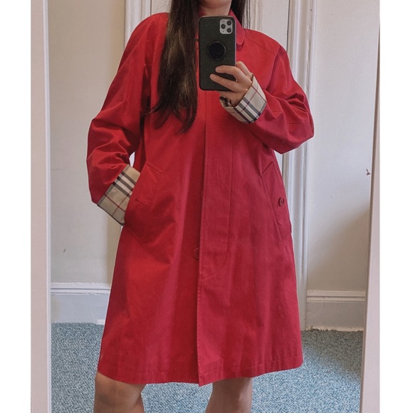 Red Burberry oxford trench coat